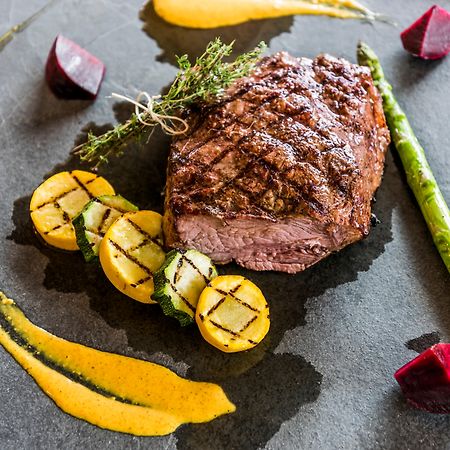 Holiday Inn Cucuta By Ihg Exterior photo A steak prepared with vegetables